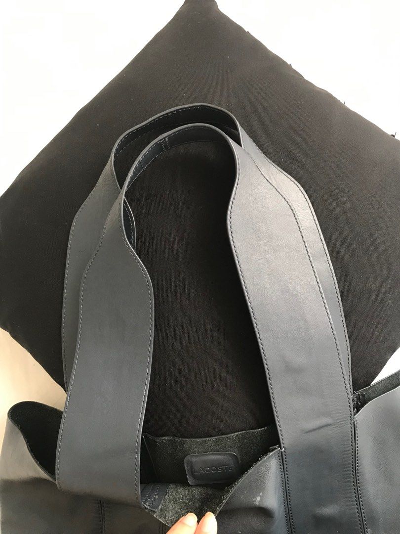 Lacoste Soft Leather Hand/Tote Bag (M) (Category: Luxury Bags & Wallets) located in Makati City. Submitted by laineycops (Listing ID 1328342978, Image 3). Description: w detachable pouch 2 compartments (incl of the pouch) min. wear as seen on photos 9.5-10in shoulder drop 10.75-11in length 17in wide 6in width at the bottom sold as is ***see about on profile rfs: decluttering.