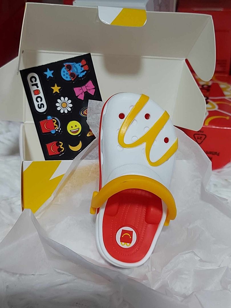 Mc Donalds collab Crocs Happy Meal (Category: Character Goods) located in Pasig City. Submitted by loveMYshop2022 (Listing ID 1328335467, Image 3). Description: Mc Donalds collab Crocs Happy Meal 2. Golden Arches Crocs Toy (White) 3. Burger Crocs Toy .