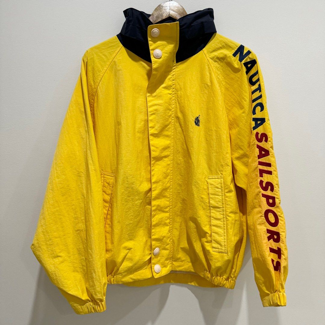 Nautica Windbreaker (Category: Coats, Jackets and Outerwear) located in Caloocan City. Submitted by _seven (Listing ID 1328318770, Image 1). Description: Nautica Windbreaker Details: With packable hoodie Size: M Dimensions: W-23.5 L-25 Condition: 9/10 Minor Issue: Slight bleed stains .