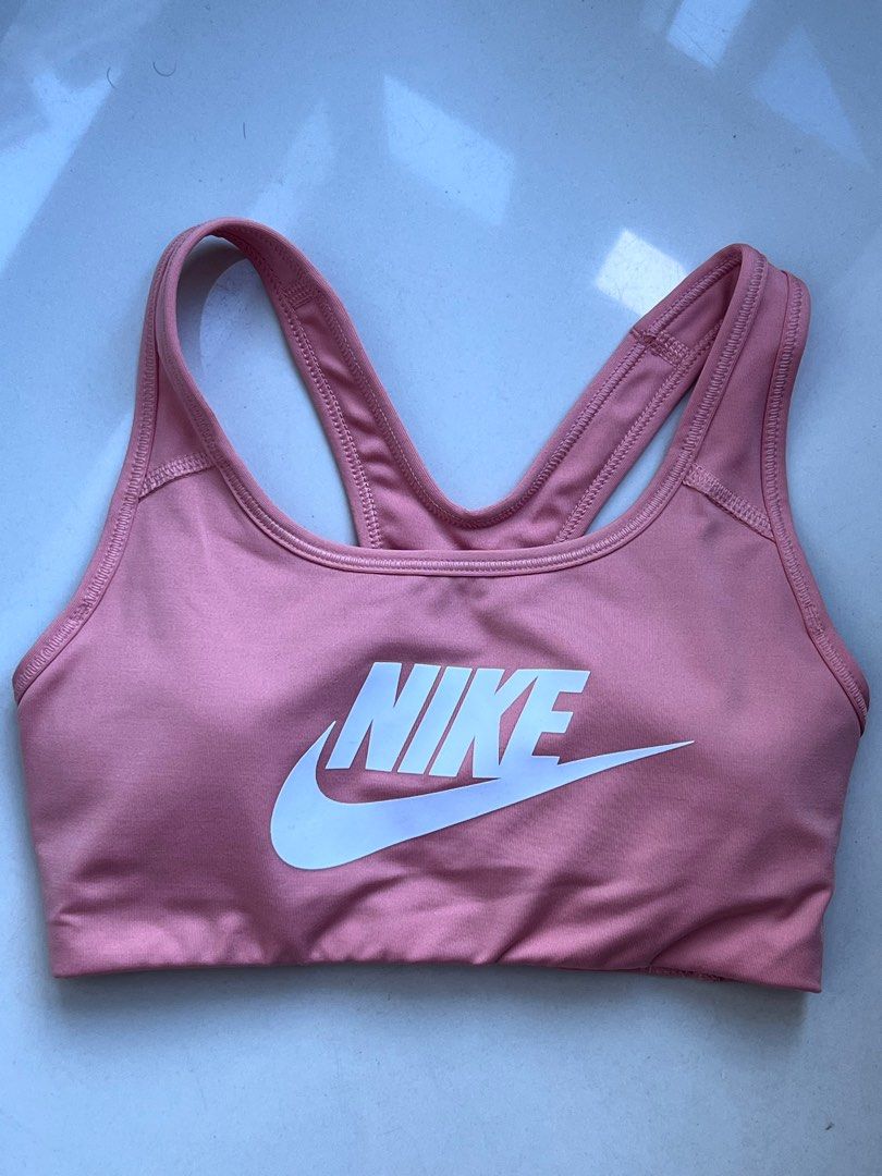 Nike Sports Bra (Small) (Category: Activewear) located in Manila. Submitted by bqthings (Listing ID 1328267669, Image 1). Description: Nike Sports Bra (Small) Color: light orange Used but in very good condition RFS: Decluttering.