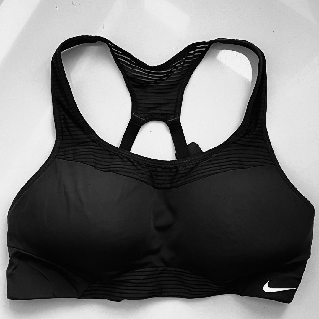 Nike Sports Bra (Small) (Category: Activewear) located in Manila. Submitted by bqthings (Listing ID 1328269220, Image 1). Description: Nike Sports Bra with clasps and adjustable straps Color: Black Note: with minor flaw (lint) on the front but barely noticable RFS: declutterinh.