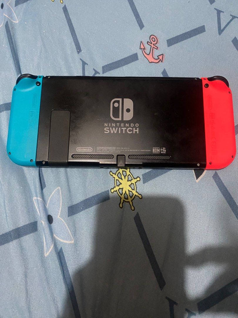 Nintendo Switch (Category: Nintendo) located in Manila. Submitted by wagamakmode (Listing ID 1328408595, Image 2). Description: Nintendo Switch V2 Inclusions Dock Charger Pouch Joycon strap Joycon slide .