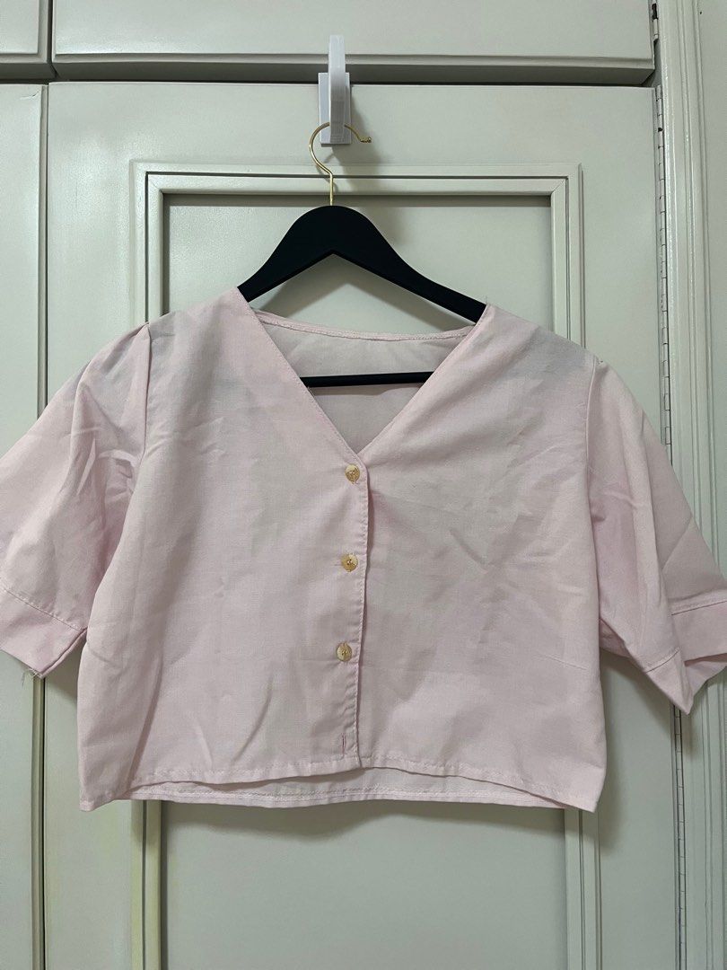Pink crop top button down (Category: Blouses) located in Mandaluyong City. Submitted by chwtme (Listing ID 1328282170, Image 1). Description: - no issues - crop top - free size.