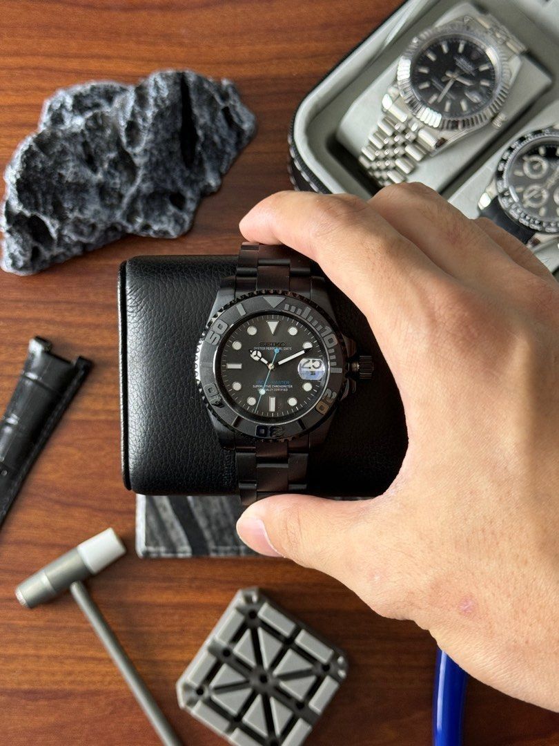 Seiko Stealth Yachtmaster Watch Seiko Mod (Category: Luxury Watches) located in Quezon City. Submitted by mnl.chll (Listing ID 1328290263, Image 3). Description: Seiko Stealth Yachtmaster Watch Case: Durable stainless Weight: 150g Diameter: 40mm Strap: Customizable (OYSTER/JUBILEE) Movement: Seiko NH35A Automatic Luminous: Yes Mode of Payment: BANK/GCASH A ₱1,000 down payment (DP) is required to confirm your order, with the remaining balance to b