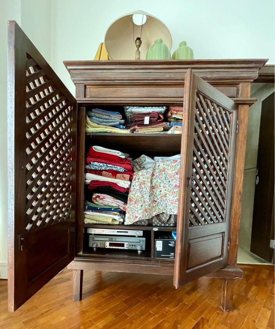 Solid Teak Cabinet (Category: Shelves, Cabinets & Racks) located in Kuala Lumpur. Submitted by BladeRunner (Listing ID 1328284104, Image 3). Description: Height 160cm × Width 124cm x Depth 76cm. In excellent condition Double-hinged doors so doors can be opened and fully ‘folded back’ to the sides of the cabinet. Can be used as a wardrobe, linen closet, storage unit, etc. Fits will into a Balinese, Rustic or even Modern Tropical interior. Selling 