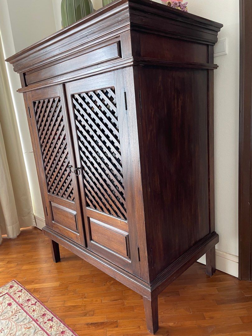 Solid Teak Cabinet (Category: Shelves, Cabinets & Racks) located in Kuala Lumpur. Submitted by BladeRunner (Listing ID 1328284104, Image 2). Description: Height 160cm × Width 124cm x Depth 76cm. In excellent condition Double-hinged doors so doors can be opened and fully ‘folded back’ to the sides of the cabinet. Can be used as a wardrobe, linen closet, storage unit, etc. Fits will into a Balinese, Rustic or even Modern Tropical interior. Selling 