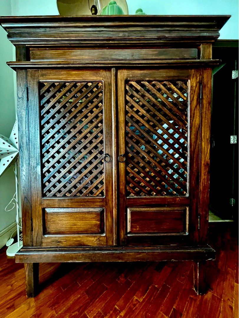 Solid Teak Cabinet (Category: Shelves, Cabinets & Racks) located in Kuala Lumpur. Submitted by BladeRunner (Listing ID 1328284104, Image 1). Description: Height 160cm × Width 124cm x Depth 76cm. In excellent condition Double-hinged doors so doors can be opened and fully ‘folded back’ to the sides of the cabinet. Can be used as a wardrobe, linen closet, storage unit, etc. Fits will into a Balinese, Rustic or even Modern Tropical interior. Selling 
