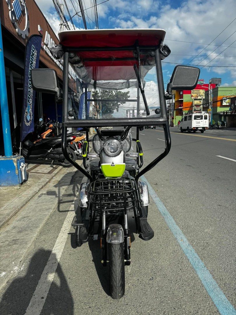 SUPER CODE 001A DISC BRAKE - 3 WHEELS E-TRIKE WITH ROOF & WINDSHIELD (Category: Bicycles) located in Marikina City. Submitted by keionlines85428 (Listing ID 1328400581, Image 2). Description: SUPER CODE 001A DISC BRAKE - 3 WHEELS E-TRIKE WITH ROOF & WINDSHIELD ‼️001A DISC BRAKE▪️₱27,000 📌Specs ✔️WITH AUTOMATIC WIPER ✔️WITH ROOF & WINDSHIELD ✔️WITH SIDEMIRROR ✔️DISC BRAKE FRONT ✔️3 SEATER WITH CHILD SEAT ✔️With alarm and keys ✔️48V 20ah ( ORIGINA