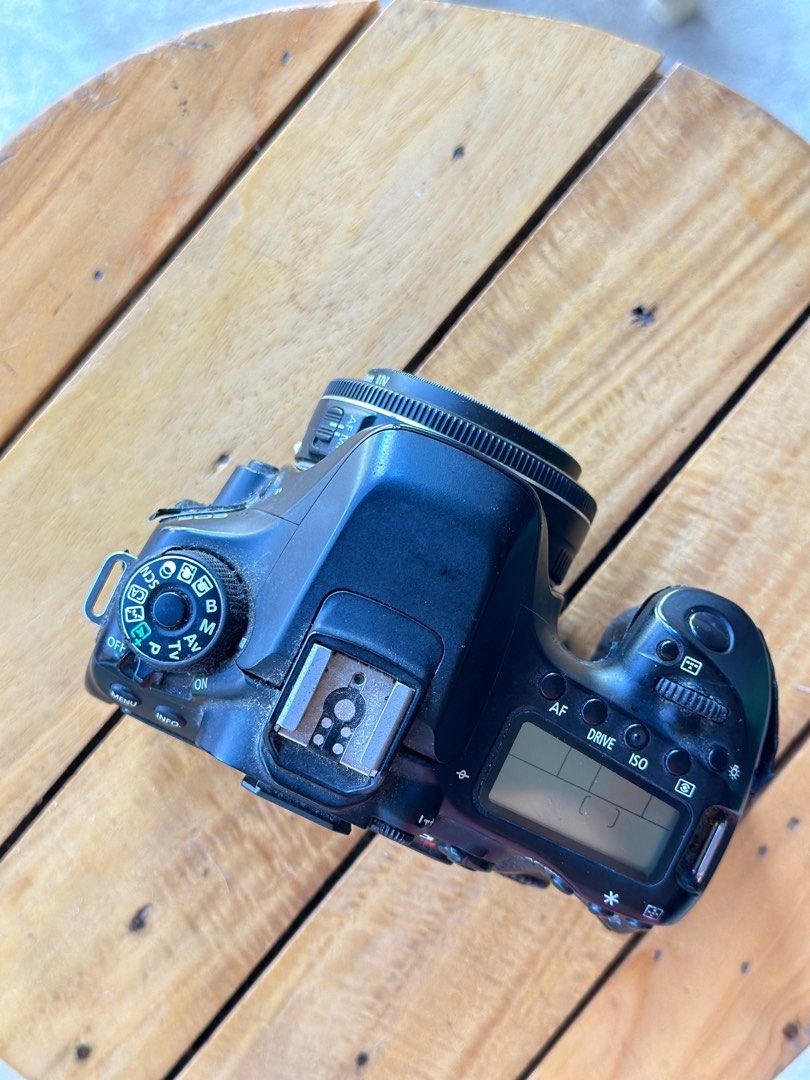 Canon EOS 80D (Category: Cameras) located in Dumaguete. Submitted by nananabanana (Listing ID 1323680760, Image 2). Description: Item Details: - Canon EOS 80D (Body Only) Included: - One battery - Charger - Replacement dial (needs to be installed) Condition: Issues - Loose rubber parts - Dial needs replacement (but I have a replacement ready) - LCD screen has minimal vignetting - SD card reader is not working, requires repair (~1000 pesos estimat