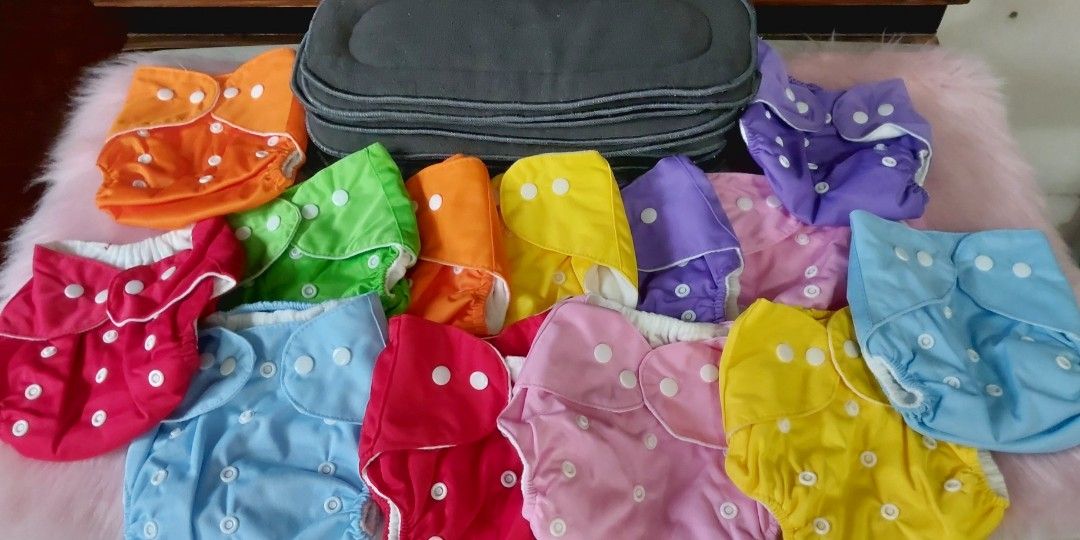 Cloth diapers with free reversible bag (Category: Diapers & Baby Wipes) located in Manila. Submitted by mpirerules (Listing ID 1323657992, Image 1). Description: Cloth diaper set with bamboo inserts Washed, stored, never used Selling the entire set for Php1500 comes with free reversible bag MOP: BDO/BPI bank deposit or funds transfer; Gcash/Maya.