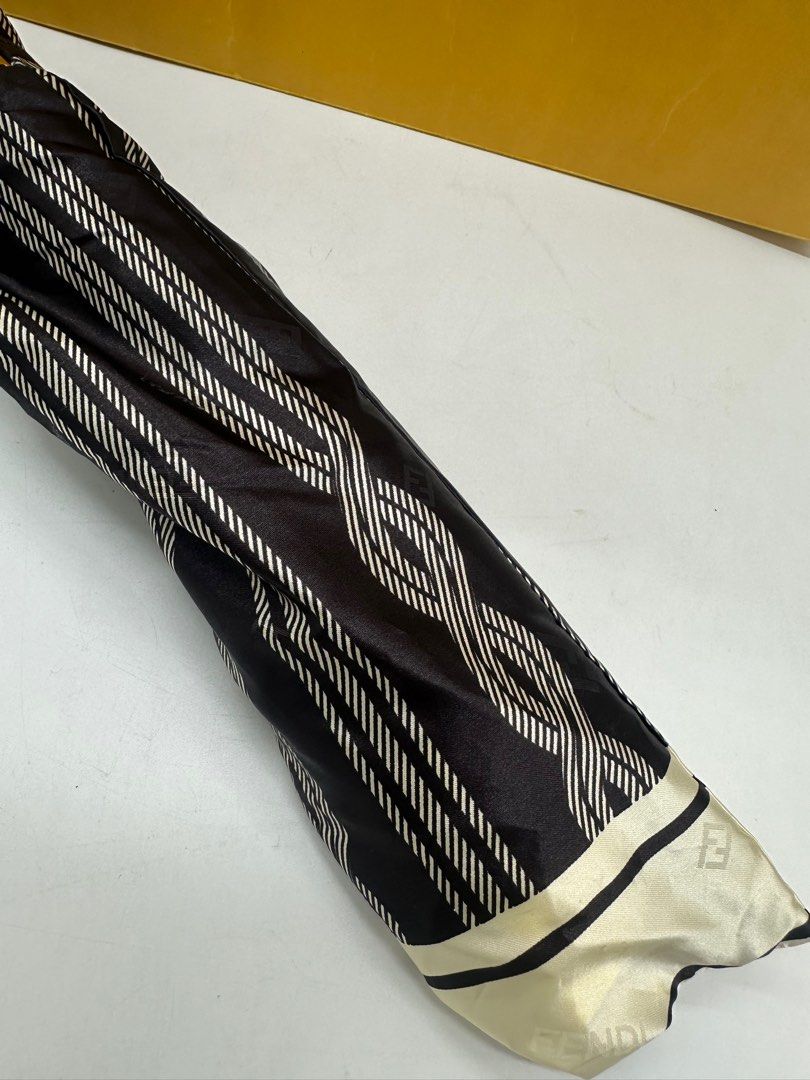 Fendi umbrella unused (Category: Umbrellas) located in Manila. Submitted by davidspreowned (Listing ID 1323768258, Image 3). Description: Fendi foldable umbrella unused stock only it comes with dustbag & paperbag minor fadings on the fendi logo but nevertheless no more issue.