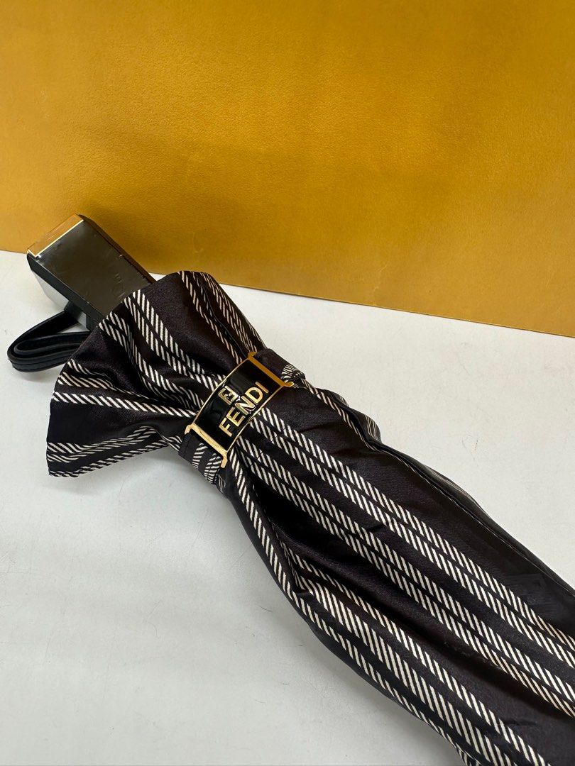 Fendi umbrella unused (Category: Umbrellas) located in Manila. Submitted by davidspreowned (Listing ID 1323768258, Image 2). Description: Fendi foldable umbrella unused stock only it comes with dustbag & paperbag minor fadings on the fendi logo but nevertheless no more issue.