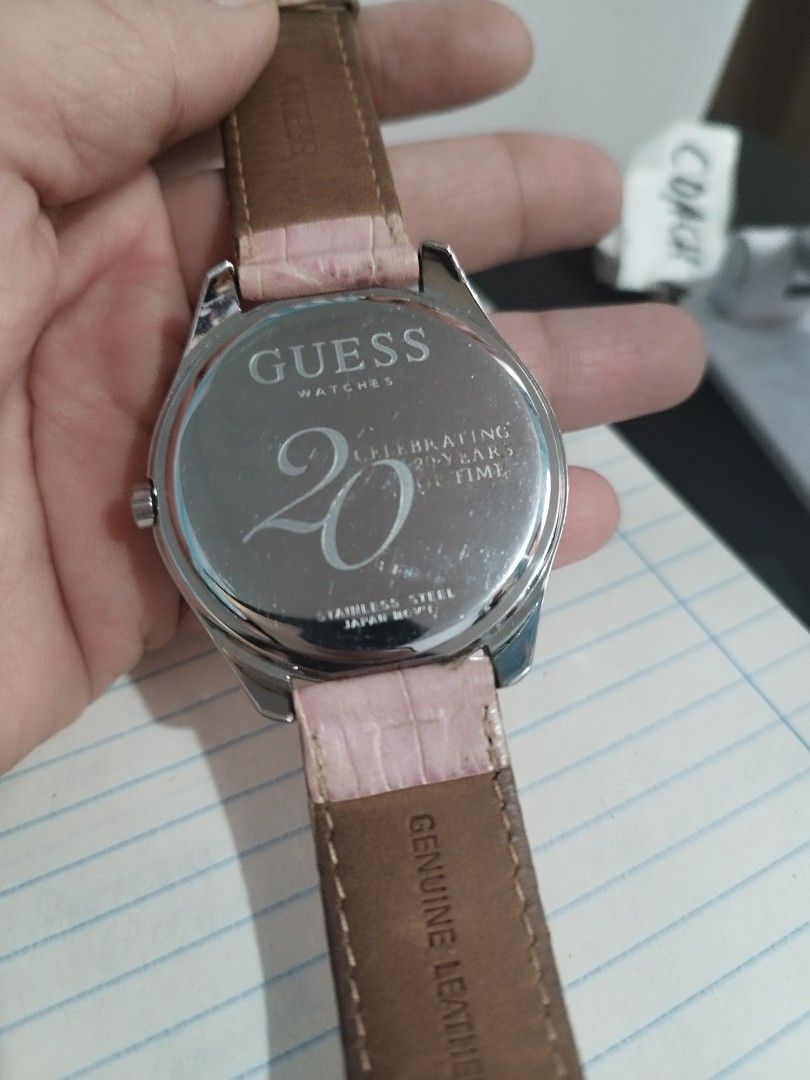 Guess 20th Anniversary Women's Watch - Silver Script Dial & Pink Strap (Category: Luxury Watches) located in Quezon City. Submitted by redragtag (Listing ID 1323718324, Image 3). Description: GUESS 20th Anniversary Edition Women's Watch – Silver Script Dial & Pink Strap Description: Selling an authentic, limited-edition GUESS 20th Anniversary quartz watch. This eye-catching fashion piece features a silver sunray dial with a prominent crystal-stud