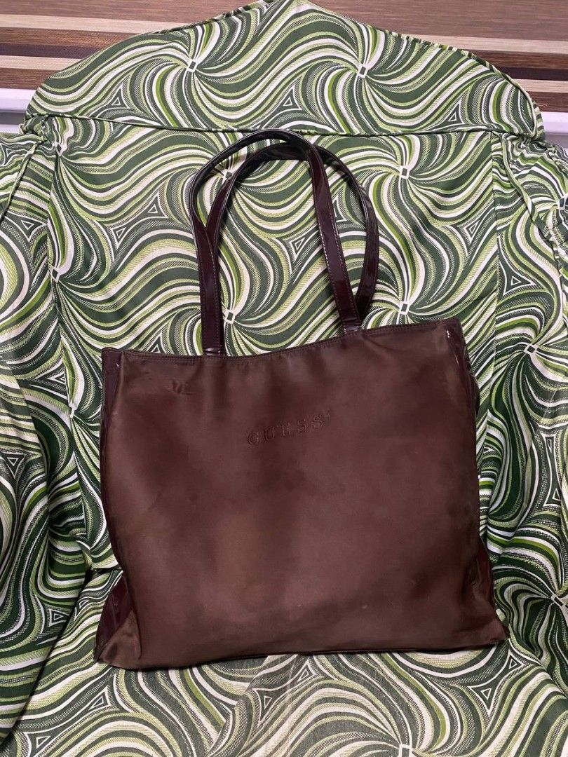 Guess brown tote bag/ shoulder bag (Category: Tote Bags) located in Malolos. Submitted by sshoooo (Listing ID 1323688719, Image 1). Description: just need some wash -NOTE: IT'S ORIGINAL LP POSTED.