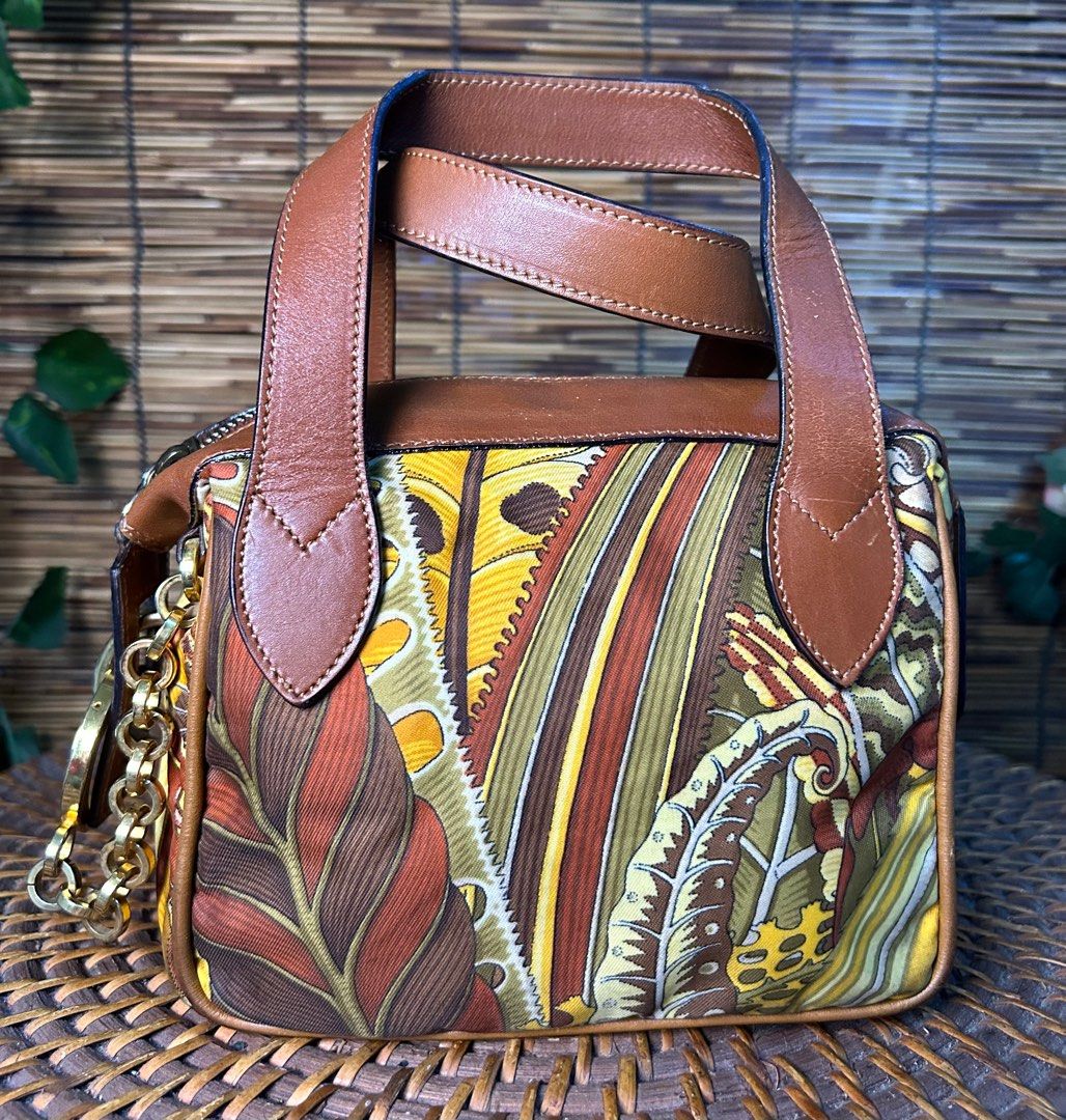 Modern Japanese Clutch With Box (Category: Luxury Bags & Wallets) located in Quezon City. Submitted by whatsinmyclosett (Listing ID 1079648672, Image 1). Description: SALVATORE FERRAGAMO Pochette Vintage. Botanical Garden Runaway Bag. Vintage bag ORIGINAL Vintage bag In very Good Condition No Extra Strap .