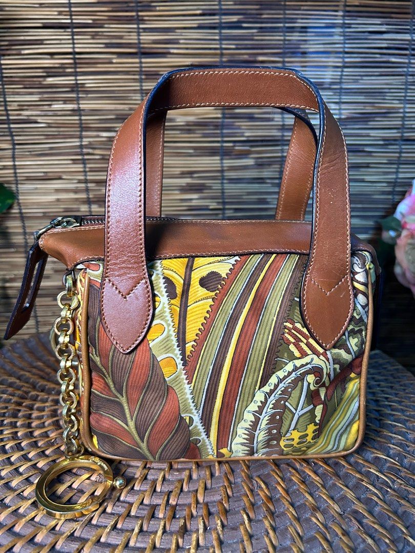 Modern Japanese Clutch With Box (Category: Luxury Bags & Wallets) located in Quezon City. Submitted by whatsinmyclosett (Listing ID 1079648672, Image 2). Description: SALVATORE FERRAGAMO Pochette Vintage. Botanical Garden Runaway Bag. Vintage bag ORIGINAL Vintage bag In very Good Condition No Extra Strap .