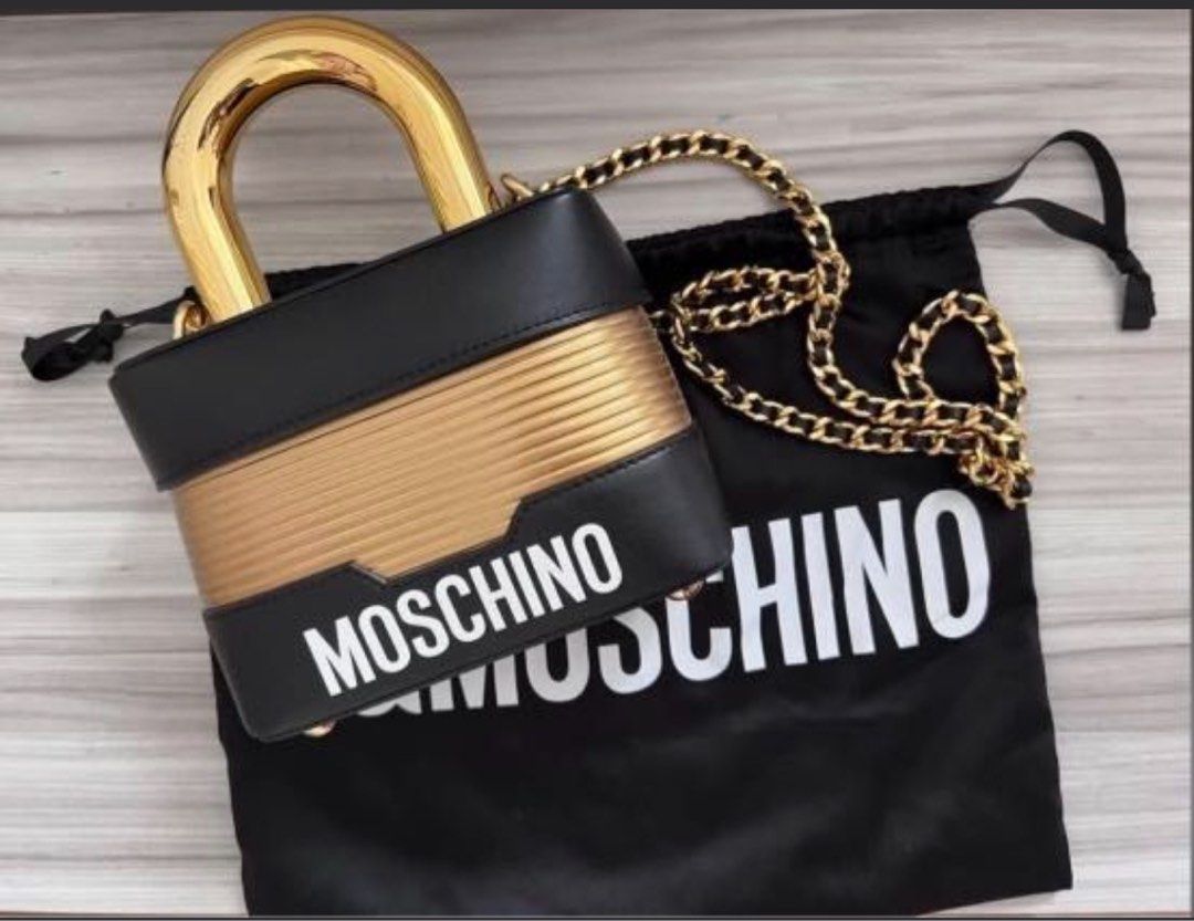 Moschino gold lock bag limited edition collaboration with H M gold sling black leather cute chic dinner party classic