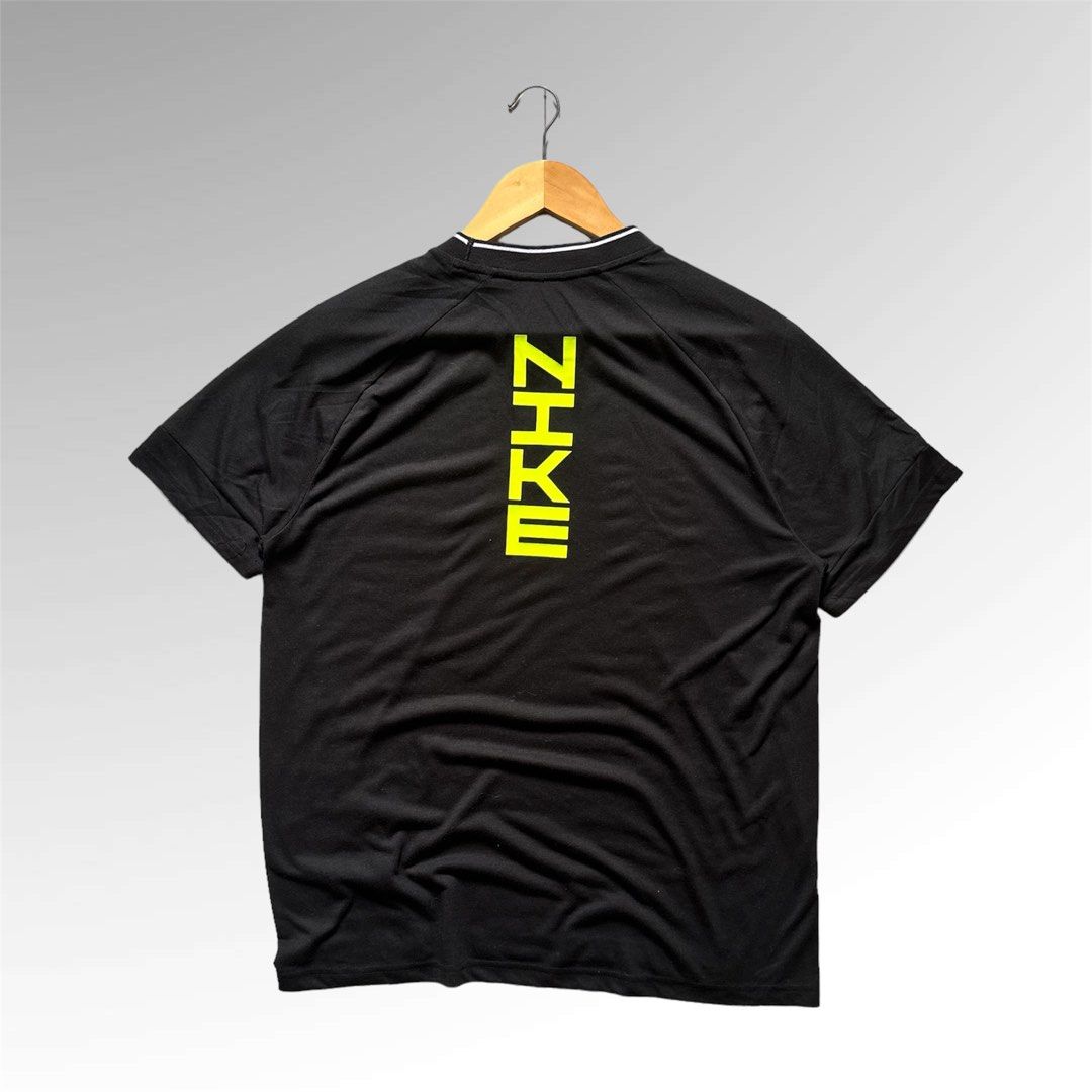 center swoosh nike shirt