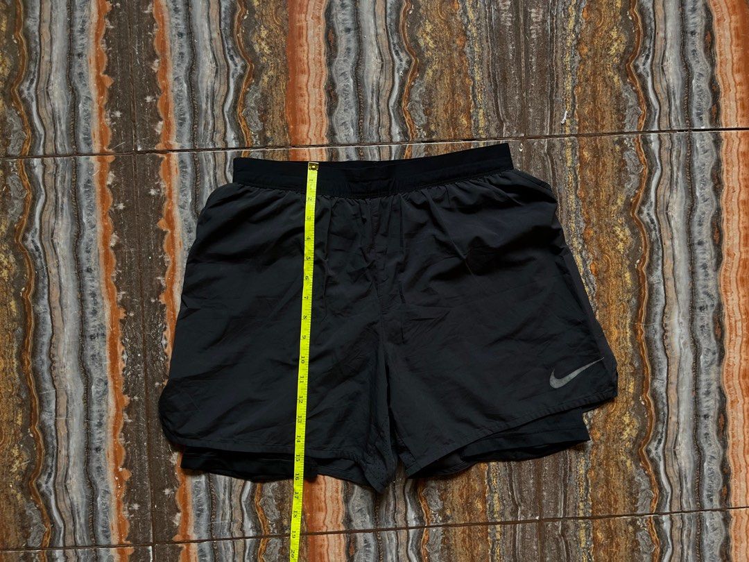 Guys wearing nike tempo shorts top