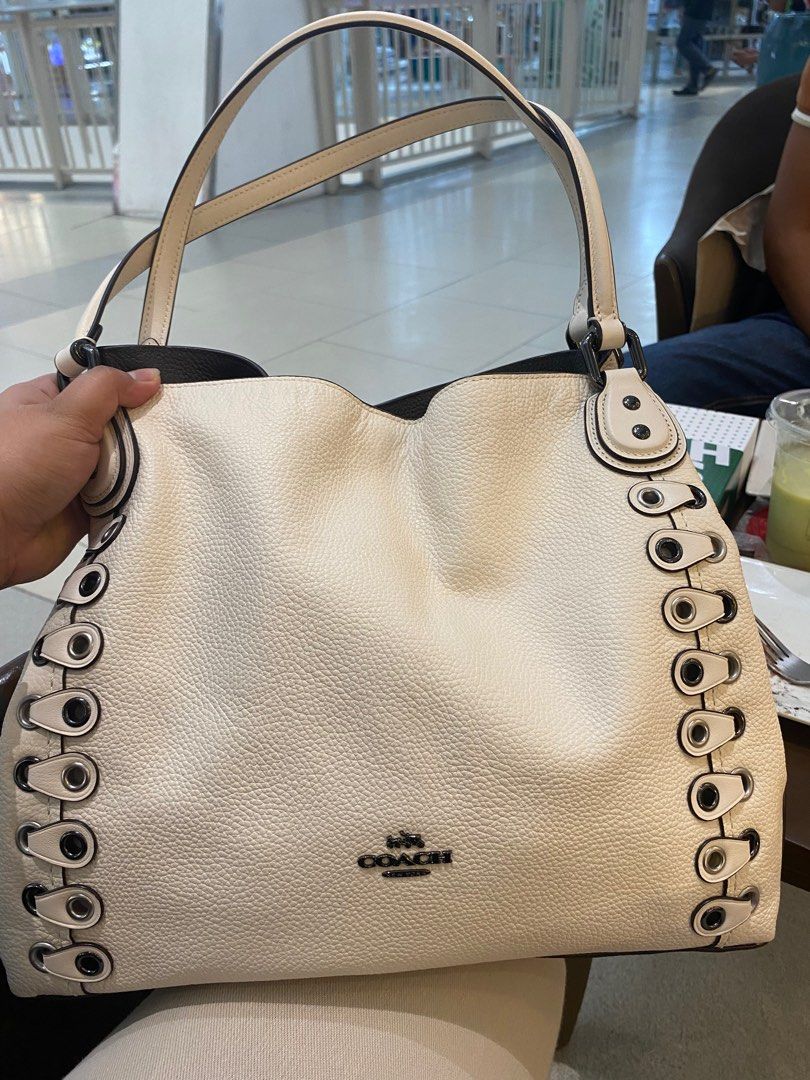 COACH Edie shoulder bag (medium) off white (Category: Luxury Bags & Wallets) located in Magalang. Submitted by katoenjeru0723 (Listing ID 1323839510, Image 1). Description: .