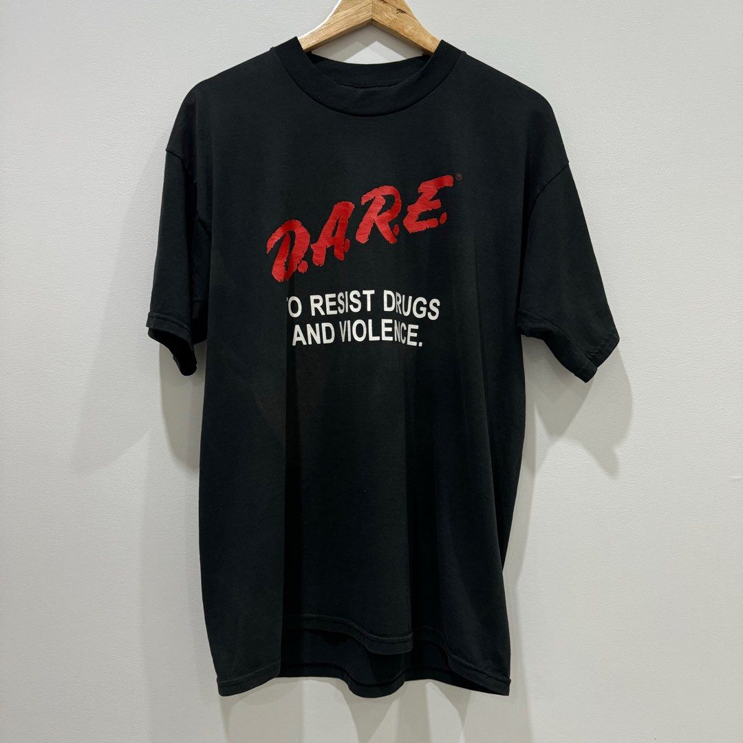 DARE Shirt (Category: Tshirts & Polo Shirts ) located in Caloocan City. Submitted by _seven (Listing ID 1323937361, Image 1). Description: Dare Shirt (Fruit of the loom tag) Size: L on tag Dimensions: W-22 L-28 Condition: 9/10 Color Rate: 8.5/10 Issue: Fade .