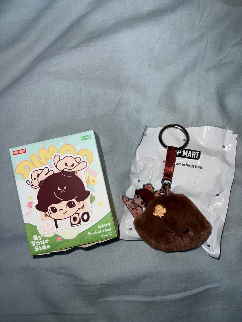 Dimoo By Your Side - Calm Down BUNDLE (Category: Designer & Blind Box Toys) located in Quezon City. Submitted by declutterion (Listing ID 1323963940, Image 3). Description: Dimoo By Your Side - Calm Down Bundle 1. Calm Down Figure (₱600) - sealed 2. Calm Down Pendant (₱450) - unsealed 3. Calm Down iPhone Lightning Cable (₱350) - unsealed Total SRP is ₱1400, but I am selling this bundle for just ₱1200! WHAT A STEAL? None of these have been used or