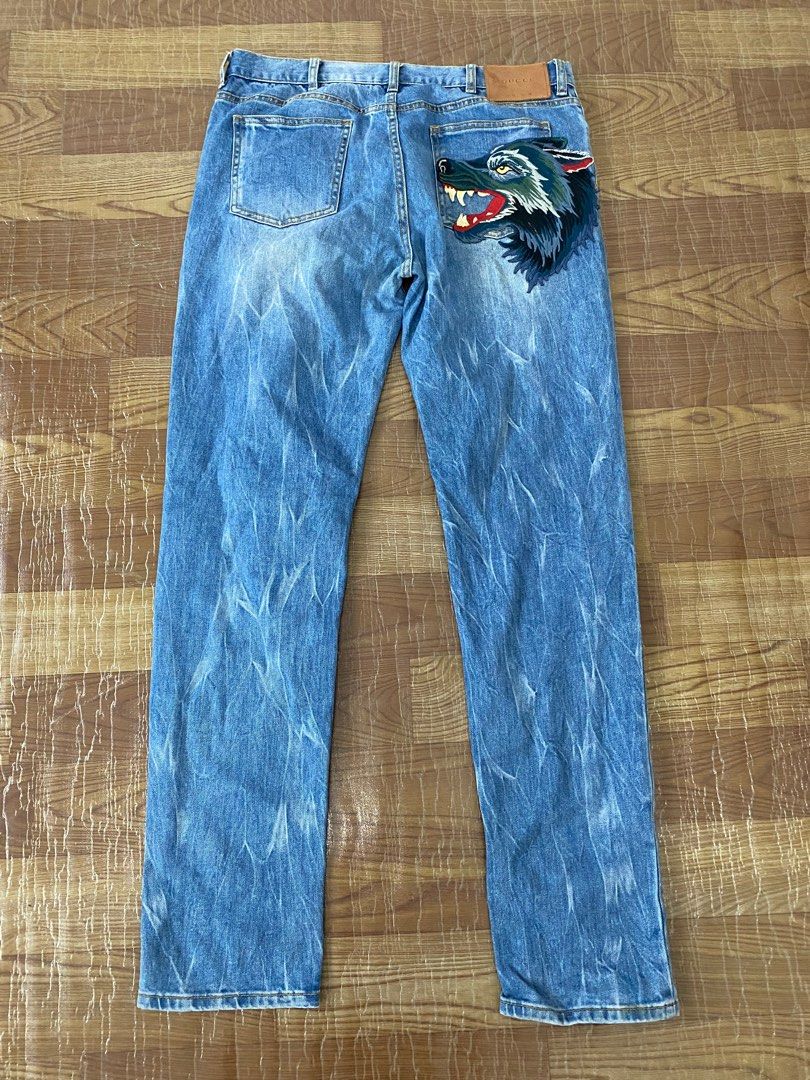 Gucci jean mens. wolf patch logo Men s Fashion Bottoms Jeans on Carousell
