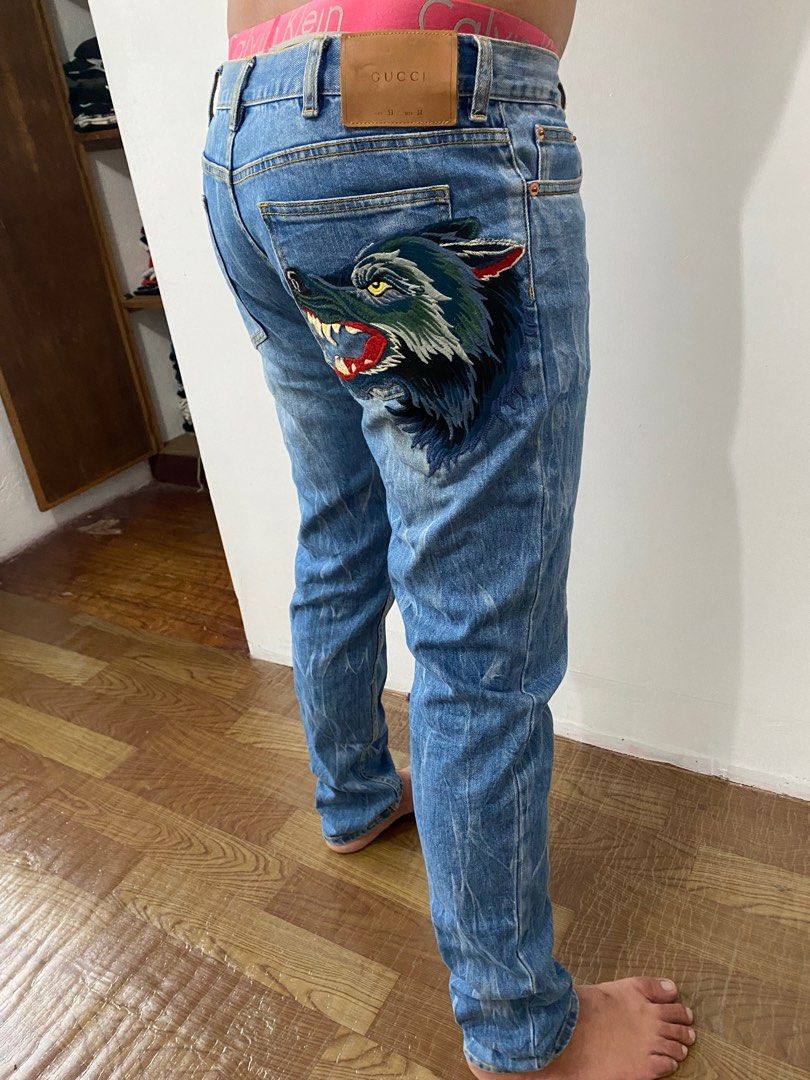 Gucci jean mens. wolf patch logo Men s Fashion Bottoms Jeans on Carousell