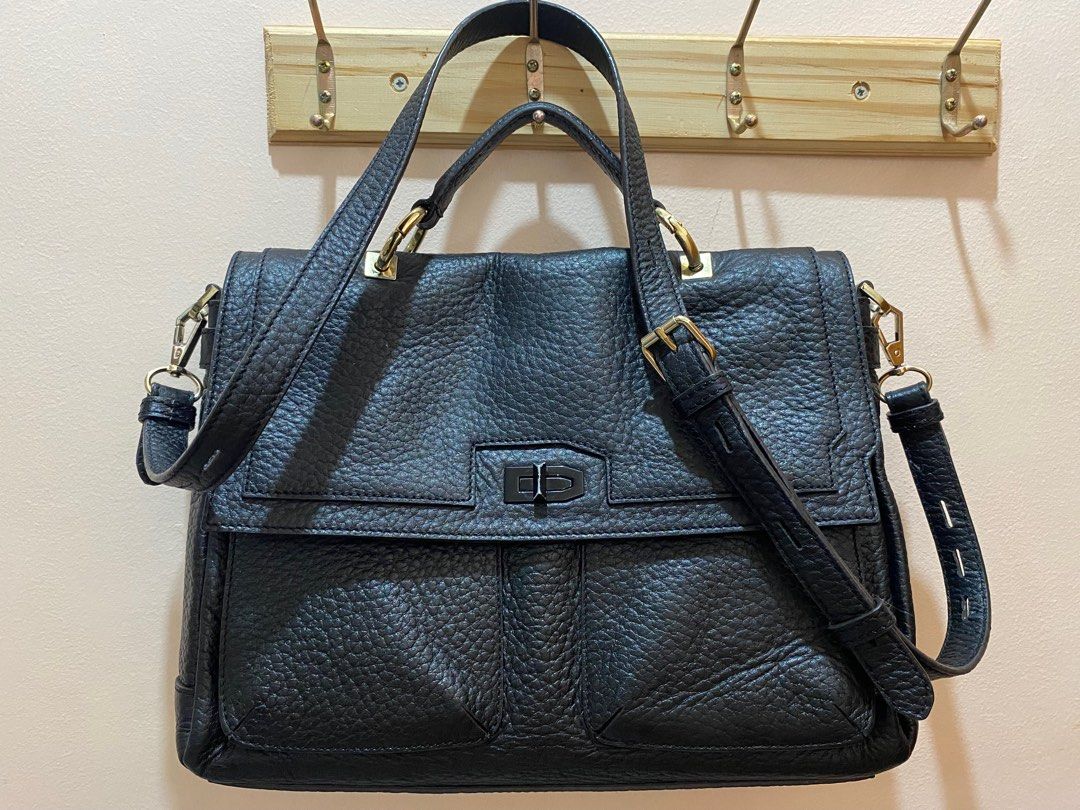 Rebecca Minkoff Convertible Shoulder Bag (Category: Luxury Bags & Wallets) located in Manila. Submitted by baggsy416 (Listing ID 1323992040, Image 1). Description: Original Rebecca Minkoff Visible signs of use on turnlock and hardwares Leather is still in very good condition.