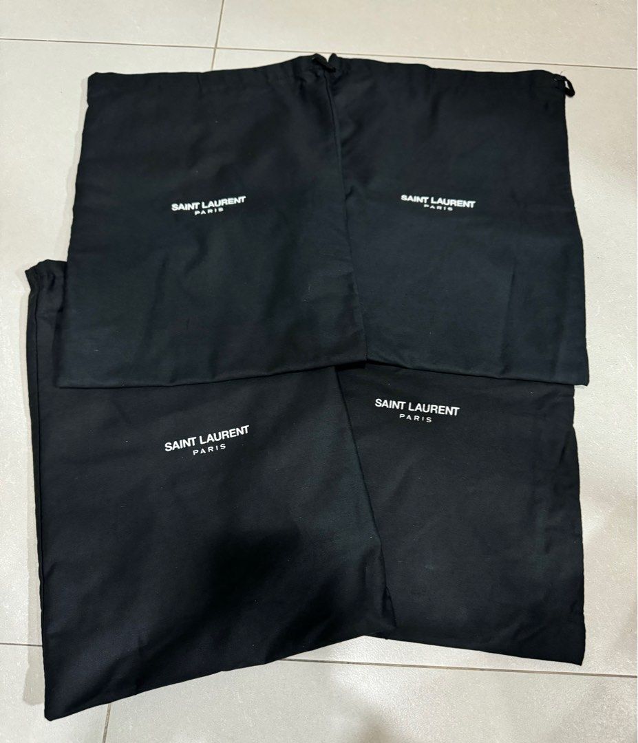 Authentic Saint Laurent Paris shoes dust bag (Category: Luxury Bags & Wallets) located in Manila. Submitted by chinchinshaven (Listing ID 1323912358, Image 2). Description: 2pcs sold . 2pcs available Guaranteed authentic Size: width 25.5cm height 36.5cm.