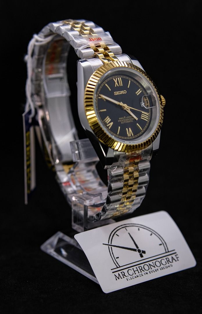Seiko Mod Datejust Two-tone (Category: Luxury Watches) located in Manila. Submitted by rafael_lesaguis (Listing ID 1323928244, Image 2). Description: BRANDNEW (Never-yet-worn) Seiko Mod Datejust Two-tone Movement: Seiko NH35 Automatic Date Feature with hacking seconds and winding Two-tone Strap Dial: Datejust roman gold markers with date window Glass: Sapphire scratch resistant Hands: Datejust Timegrapher calibrated Seals and gaskets lubricated I