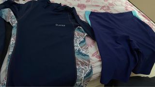 swimsuit and swim trunks62980459636866112