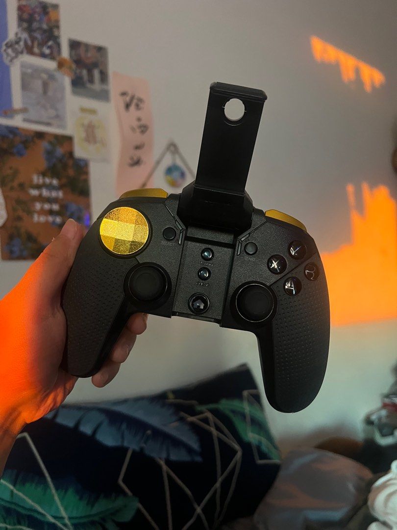 Bluetooth gaming controller for phone (Category: Controllers) located in Mandaluyong City. Submitted by sandylingling94 (Listing ID 1324126920, Image 2). Description: Bought this when I was obsessing over Playstation games sa phone, I installed a free emulator and used this as a controller. Phone attaches to it physically pero wireless. Connects via Bluetooth! Rfs: napaayos ko na lumang PSP ko hehe 🐣 See pics for orig price and the orange app li