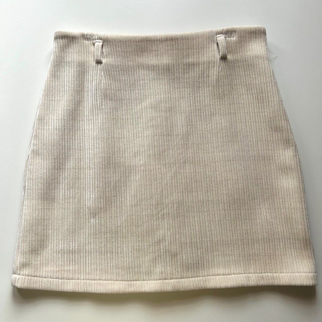 Cream Corduroy Mini Skirt (Category: Skirts) located in Cavite. Submitted by adiore (Listing ID 1324036246, Image 1). Description: fits 28 waistline zipper back.