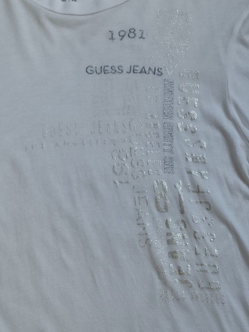 GUESS❔️tee (Category: Tshirts & Polo Shirts ) located in General Santos City (Dadiangas). Submitted by hoverfinds (Listing ID 1324021990, Image 3). Description: dimes 19"×28" color rate 9.8/10 Php 350shipped jnt There is some wear and tear. Please consider this before purchasing..
