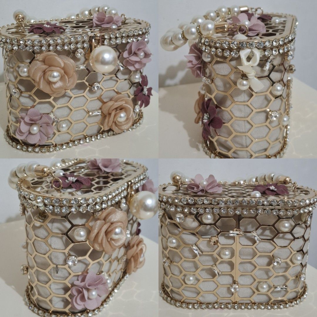 Luxury Stone Pearl Flower Handbag (Category: Luxury Bags & Wallets) located in Caloocan City. Submitted by shopfab. (Listing ID 1324018775, Image 2). Description: Material: Metallic Size: 18.8*9*12cm bought for 1500+ used once, good as new.