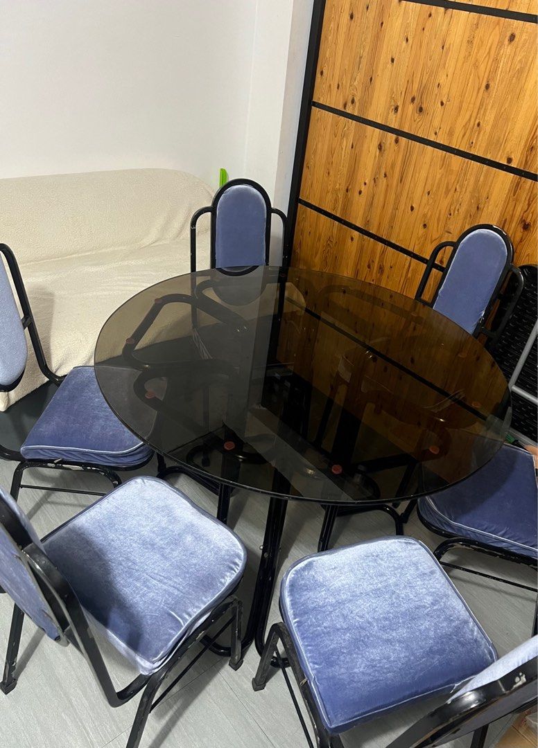Round glass dining table 6-seater (Category: Tables & Sets) located in Marilao. Submitted by chachi101 (Listing ID 1324179232, Image 1). Description: • Velvet chairs (cover can be changed; it has zippers) • Very thick glass • Sturdy and stable (no wobbling) Rfs: Decluttering the storage room.