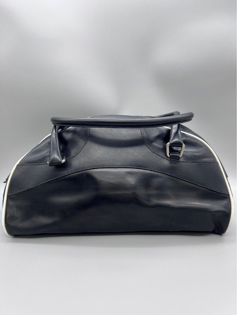 Authentic Prada Bowlers Bag (Category: Luxury Bags & Wallets) located in Cagayan de Oro. Submitted by riggstuffs (Listing ID 1311145886, Image 2). Description: ➡️ Guaranteed Authentic Prada Bowlers Bag Made in Italy With code Exterior area is good but has a slight signs of use Interior is clea Small in size No other inclusion Disclaimer : Riggstuffs is not associated or affiliated with the brand posted. All copyrights and trademarks belong solely