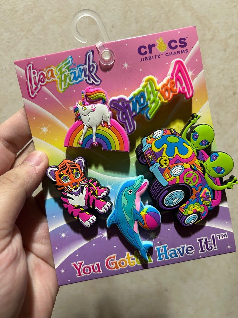 BRAND NEW AUTHENTIC CROCS LISA FRANK JIBBITZ PACK (Category: Other Accessories) located in Mandaluyong City. Submitted by katinka16 (Listing ID 1198440531, Image 2). Description: Brand new authentic, lisa Frank jibbitz pack. Limited edition. .