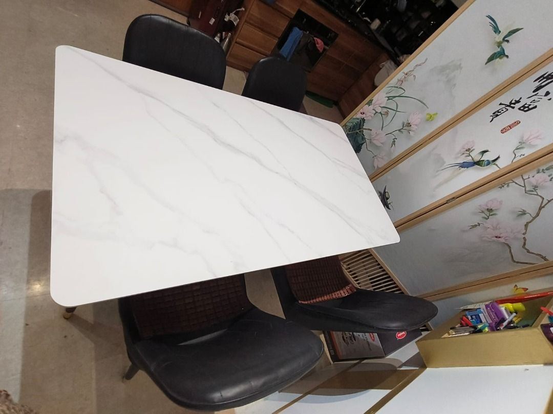 Dining table (Category: Tables & Sets) located in Singapore. Submitted by drache (Listing ID 1324332699, Image 2). Description: Selling the dining table and chairs only (1 set: 1 table and 4 chairs), free: table cover. Marble stone top enough for 6 people..