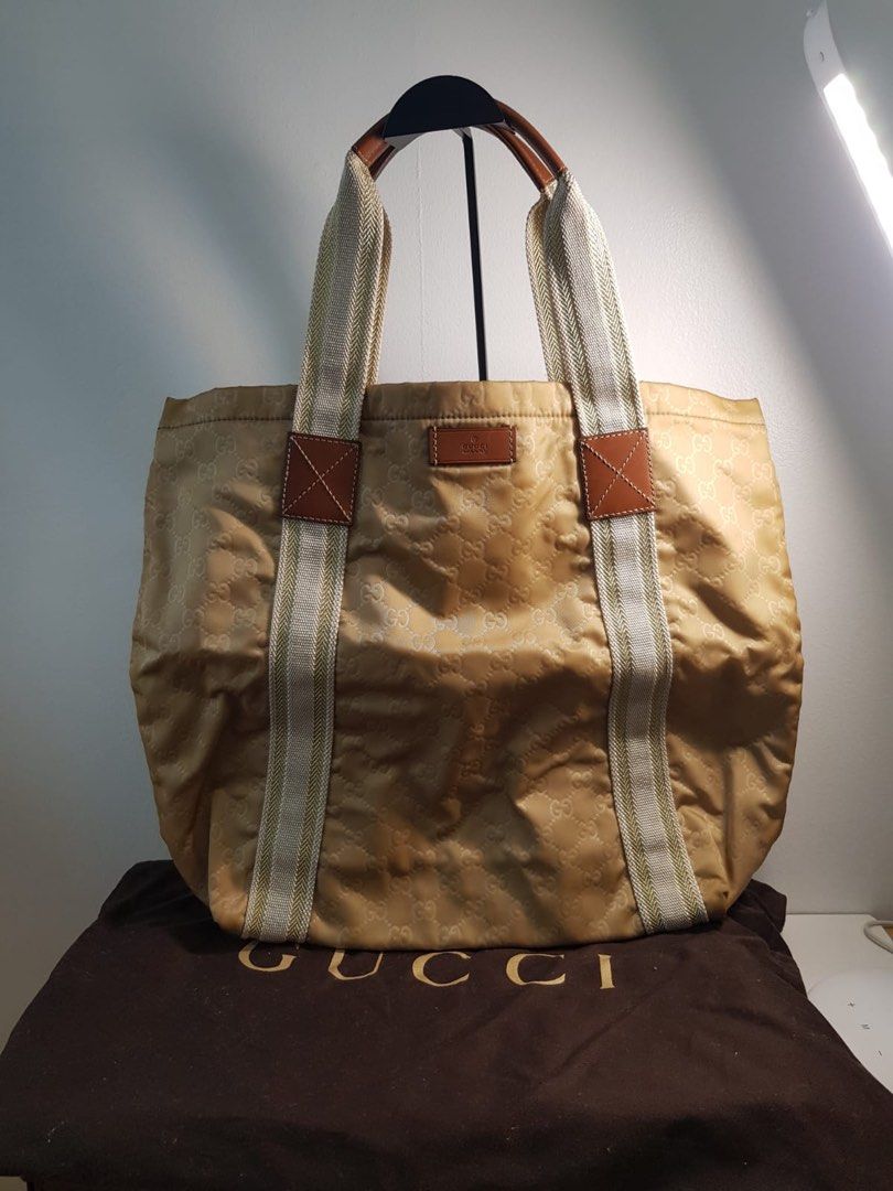 Gucci Nylon Tote (Category: Luxury Bags & Wallets) located in Paranaque City. Submitted by shopjmac (Listing ID 1324349048, Image 1). Description: Discoloration on seams.