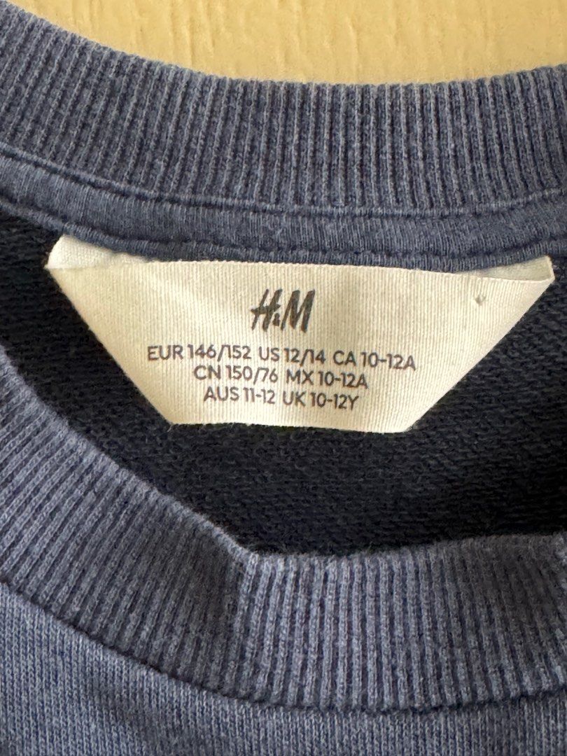 H&M Kids Sweatshirt NavyBlue (Category: Babies & Kids Fashion) located in Pasig City. Submitted by lovestuff_shop (Listing ID 1324222643, Image 3). Description: In great condition. Barely used. All prints and stitches are intact. 10-12 years old. .