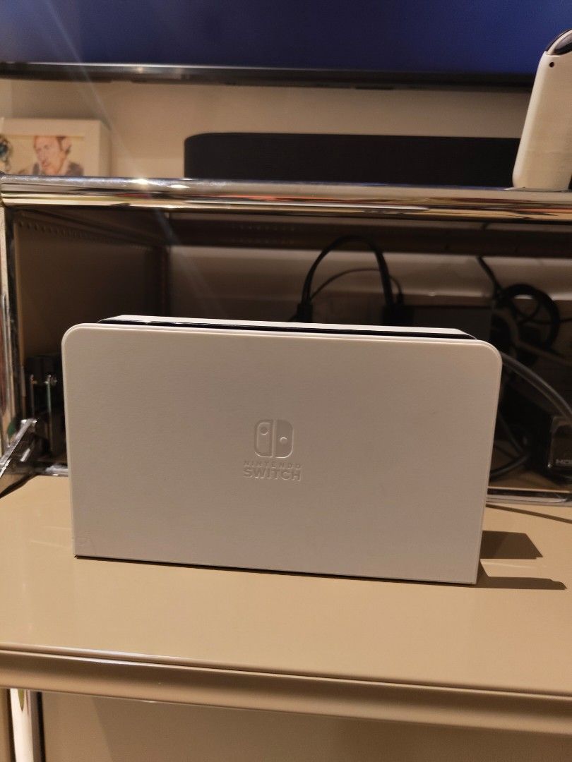 Nintendo switch OLED (Category: Nintendo) located in Singapore. Submitted by bingrru (Listing ID 1324345721, Image 3). Description: Comes with several games I have zeldas with a friend, top up 50$ for both..