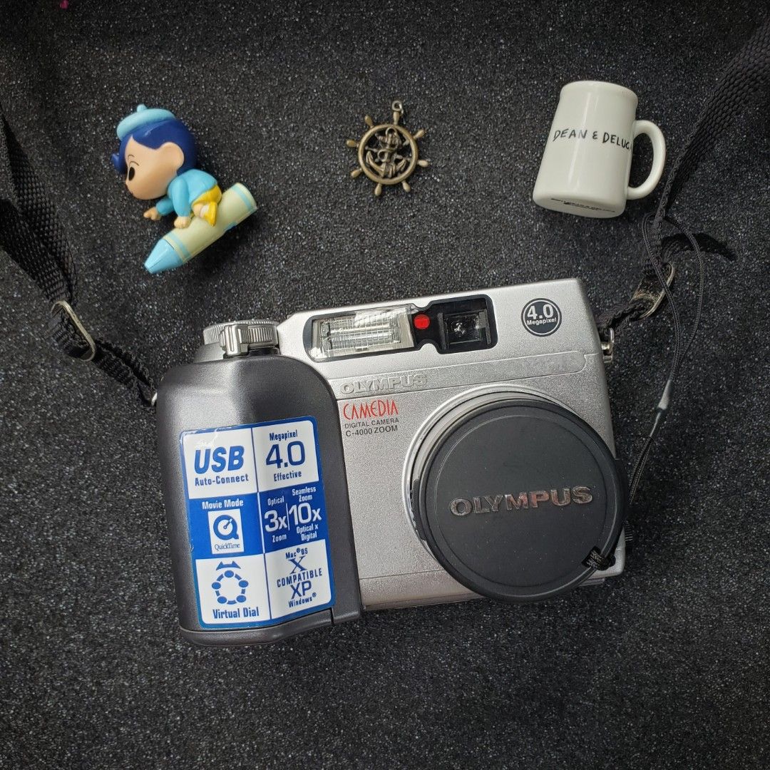 Olympus Camedia C-4000 Zoom (Category: Cameras) located in Pasay City. Submitted by corncube.collective (Listing ID 1324247877, Image 1). Description: OLYMPUS CAMEDIA C-4000 ZOOM Limited Edition!!! Hard to find ng Super mint condition neto. 10/10 Body Cosmetics 4.0 Megapixels 3x Optical Zoon 10x Seamless Zoom OptixalxDigital Inclusions -Unit - Camera strap -Camera Pouch #olympus #olympuscamedia #olympuscamediac4000zoom.