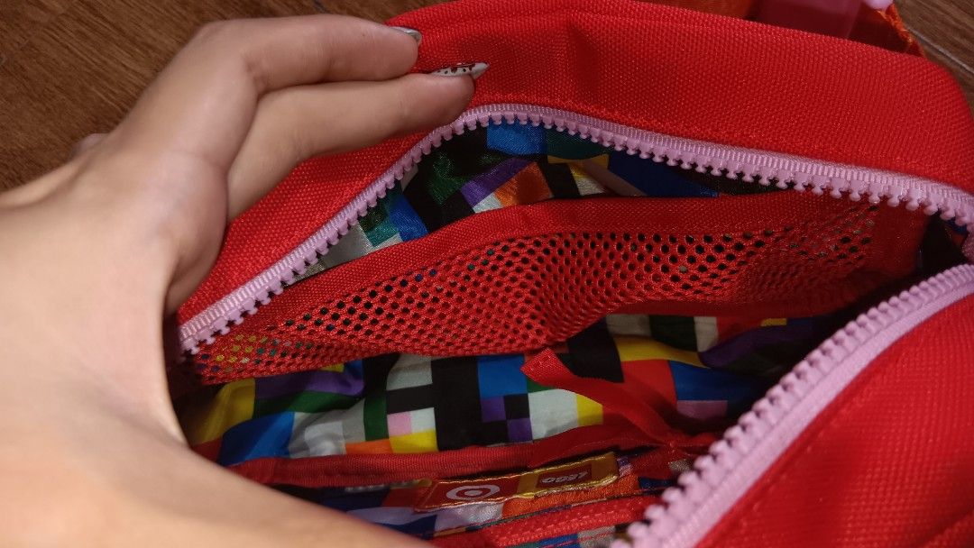 preloved Lego x Target belt bag (Category: Cross-body Bags) located in Quezon City. Submitted by piptea (Listing ID 1324282461, Image 3). Description: gift to me but i dont really use it that much dont like the design too shipped from USA open to bargains.