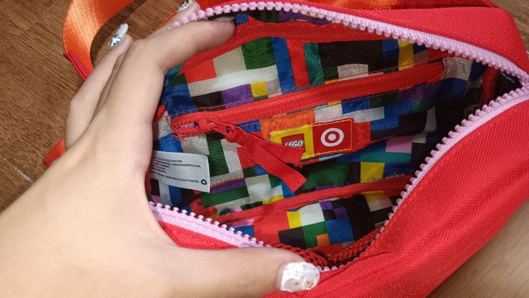 preloved Lego x Target belt bag (Category: Cross-body Bags) located in Quezon City. Submitted by piptea (Listing ID 1324282461, Image 2). Description: gift to me but i dont really use it that much dont like the design too shipped from USA open to bargains.