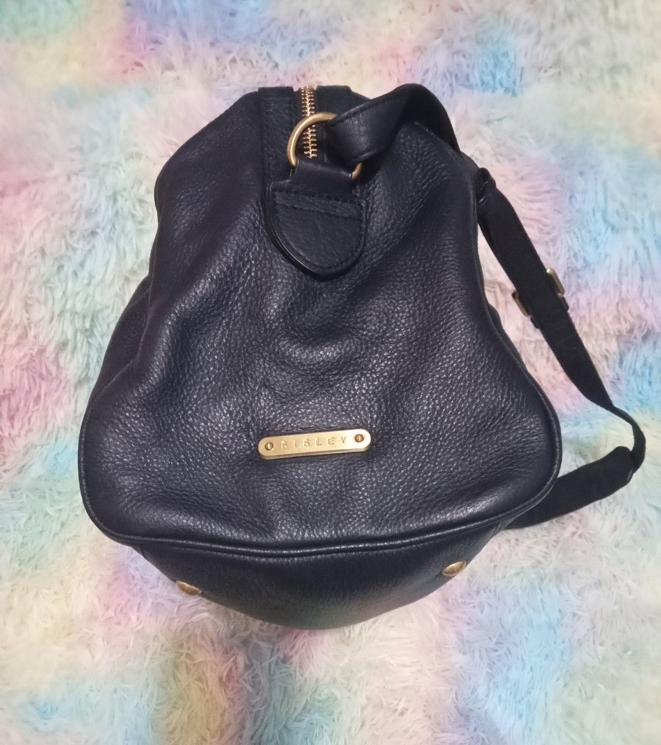 Sisley Travel Bag (Category: Luxury Bags & Wallets) located in Makati City. Submitted by justmine1216 (Listing ID 1324285792, Image 2). Description: Original Sisley Bag Navy Blue Color In good condition Dimension: Length - 34cm or 13.5" Width - 14cm or 5.5" Height - 20cm or 8" Note: SF will be shouldered by the buyer.