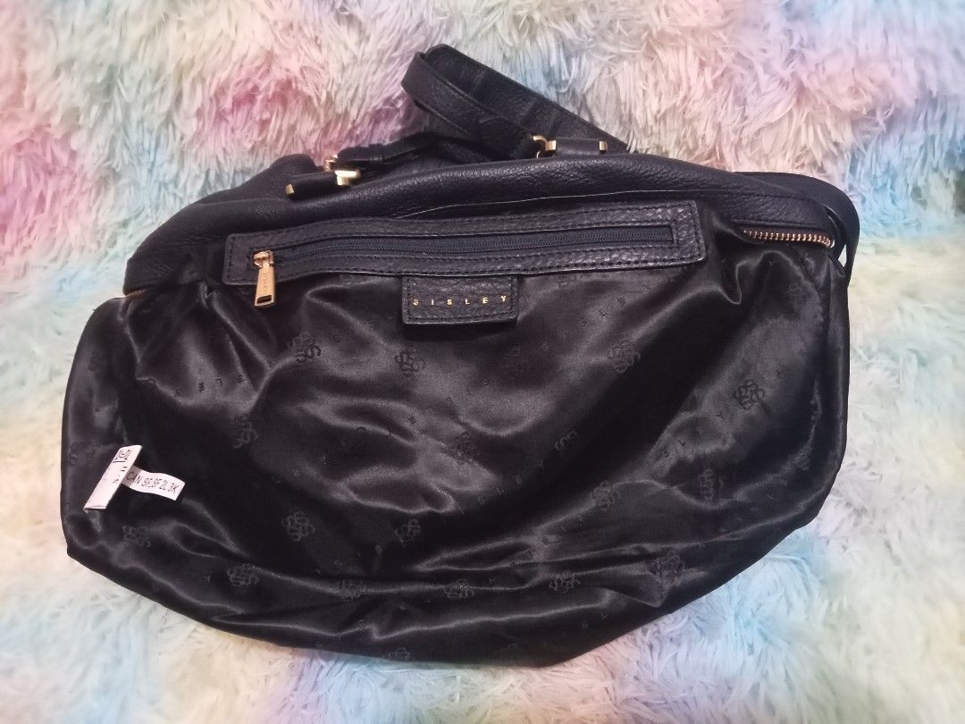 Sisley Travel Bag (Category: Luxury Bags & Wallets) located in Makati City. Submitted by justmine1216 (Listing ID 1324285792, Image 3). Description: Original Sisley Bag Navy Blue Color In good condition Dimension: Length - 34cm or 13.5" Width - 14cm or 5.5" Height - 20cm or 8" Note: SF will be shouldered by the buyer.
