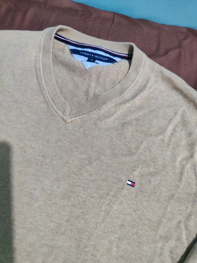Tommy Hilfiger Knitted Pullover Longsleeves Sweater Vneck (Category: Coats, Jackets and Outerwear) located in Makati City. Submitted by gwnca_ (Listing ID 1324238490, Image 2). Description: Tommy Hilfiger Longsleeve Pullover Knitted (Coffee brown color) - Size: XXL - No flaws - Worn few times only - From US message for more info.