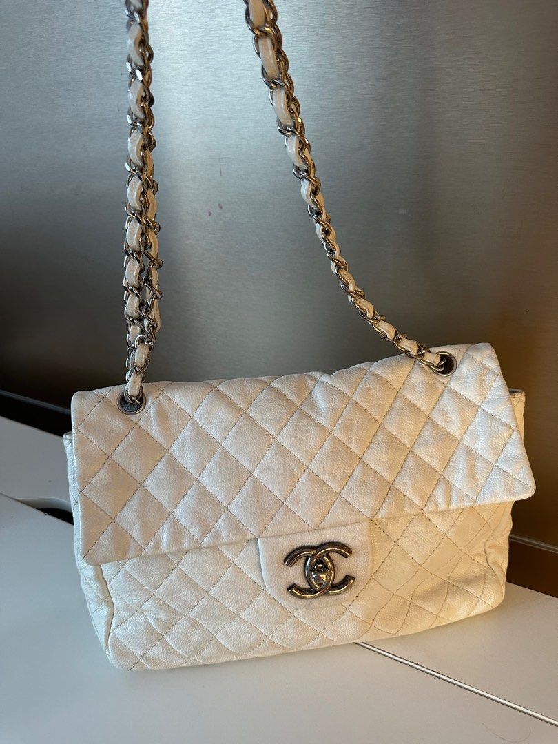 Well used Chanel Maxi classic flap